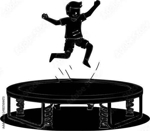 Silhouette of a young boy jumping high on a round trampoline.