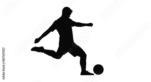 Black Silhouette of a Soccer Player Kicking a Ball in Dynamic Action Pose