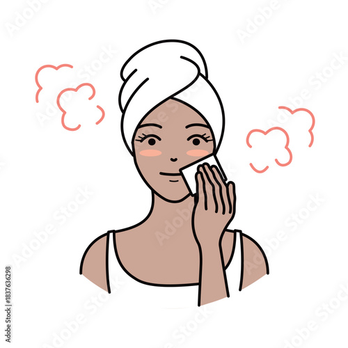 Woman with brown skin removing makeup or applying toner with a cotton pad