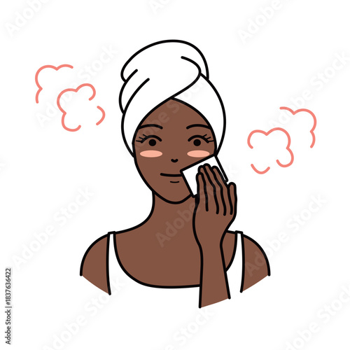 Woman with dark skin removing makeup or applying toner with a cotton pad
