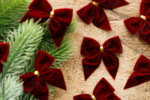Red ribbons with pine branches, Christmas tree concept.