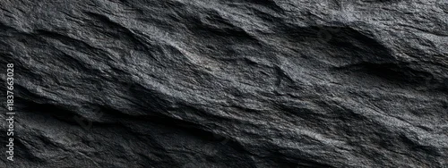 Panel kuchenny z motywem Textured Slate: The image showcases a close-up of textured slate, with its intricate patterns and rugged surface, highlighting the raw beauty and natural formation.