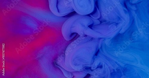 Cloud blend. Ink fluid. Defocused blue pink purple color fume wave swirling texture floating on abstract creative vivid background.