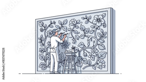 An artist intricately paints floral wall art, standing on a stool with paintbrushes and tools