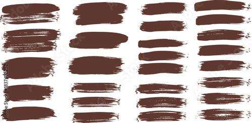 Collection of brown brush strokes and smears on a white background, perfect for artistic and design projects