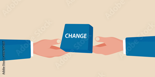 Hands exchanging a block with the word change on it