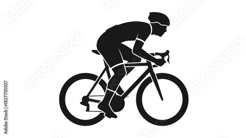A cyclist in motion captured as a striking black silhouette