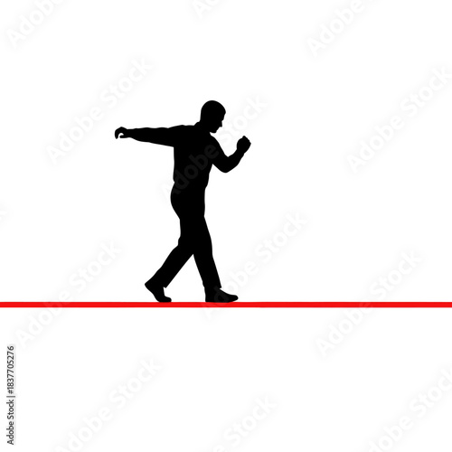 Silhouette of a man walking on a tightrope demonstrating balance and focus.