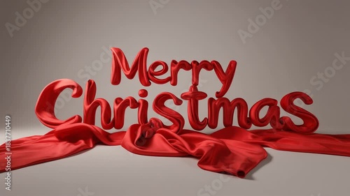 Crimson ribbon unfurls beneath elegant red 3D lettering proclaiming 'Merry Christmas' in a studio setting, evoking festive cheer