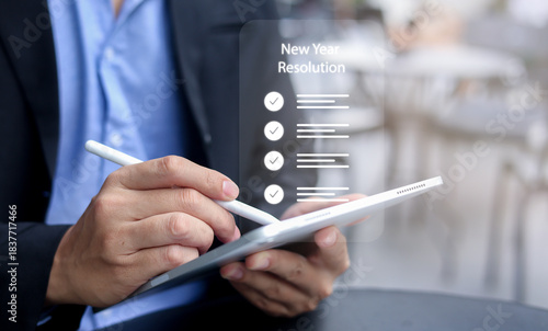 Εκτύπωση καμβά close up manager businessman hand use stylus pen to write and check to do list f