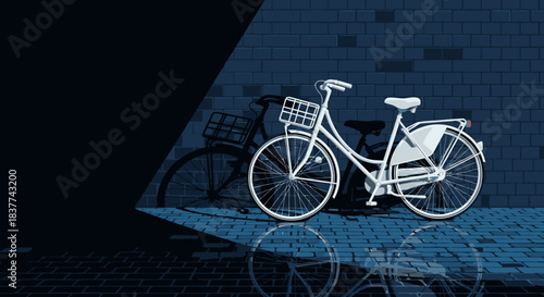A classic white bicycle with a front basket stands dramatically illuminated, casting a long, reflective shadow on the textured urban pavement.