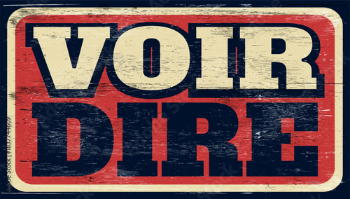 Aged and worn voir dire sign on wood