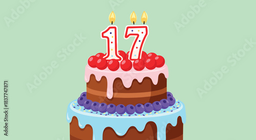 Festive two-tier birthday cake with pink and blue frosting fruit toppings and lit candles forming the number seventeen.