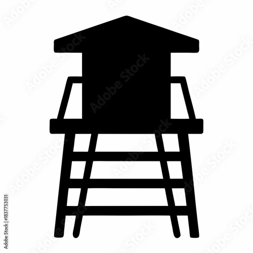 Silhouette of guard tower with observation deck and crisscross leg supports