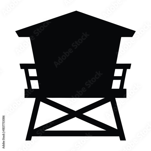 Silhouette of guard tower with observation deck and crisscross leg supports