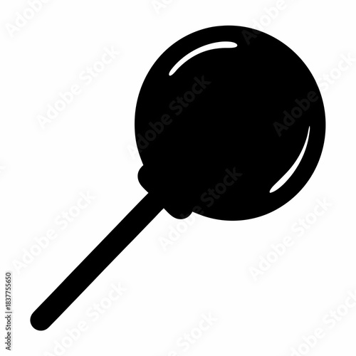 Silhouette of a classic round lollipop on a stick, a sweet treat