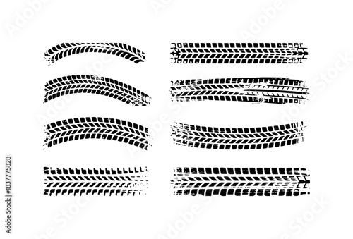 Collection of Black Tire Tracks and Imprints on White Background