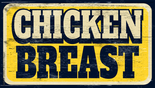 Aged and worn chicken breast sign on wood