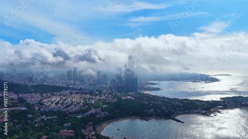 Qingdao Coastal City Aerial View with Clouds and Bay