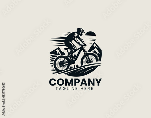 Mountain biker silhouette riding rugged trail in dynamic black vector logo illustration