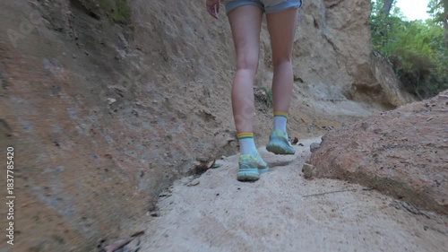 Trail Runner Legs Moving Fast Through Dry Canyon Path