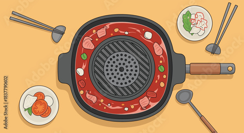 A top-down view of a Thai or Korean style barbecue grill pan with meat and vegetables cooking in a hot broth.