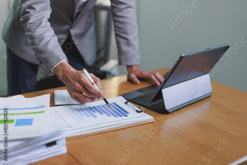 Professional analyzing business data and financial growth chart