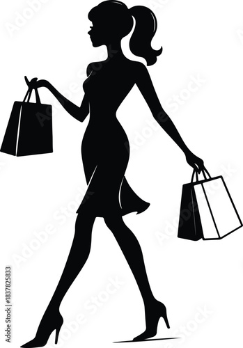 Silhouette of a woman with shopping bags walking