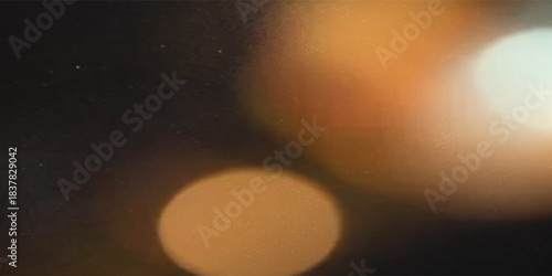 light leak overlay effect with scratch dust and bokeh light leaks,retro noisy film texture light leak flare on black background