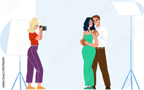 Photographer capturing happy couple during studio session