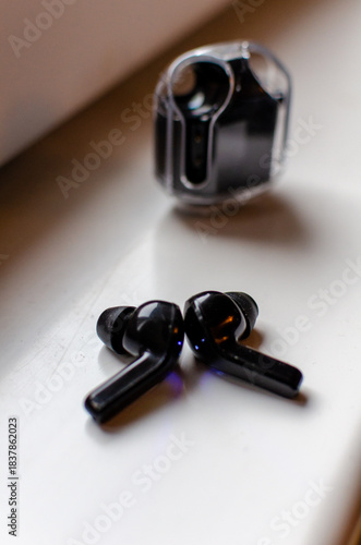 A pair of black headphones that connect via bluetooth
