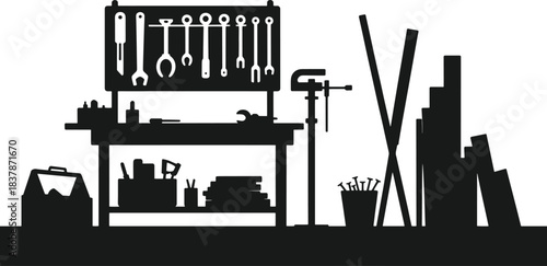 Black silhouette of a workbench with tools and materials black and white workshop