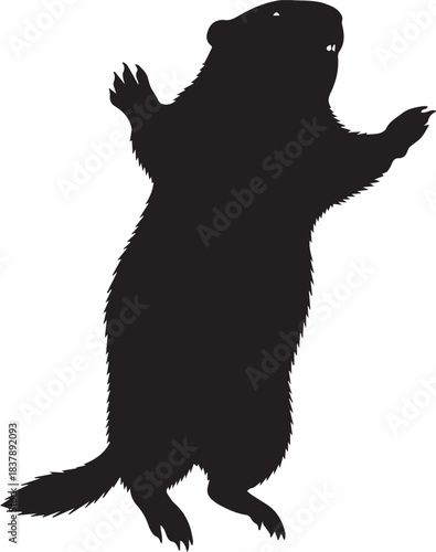 Silhouette of a groundhog standing on its hind legs with arms raised