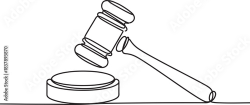 a judge's gavel and striking block.
