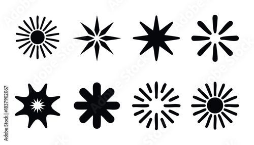 Collection of eight black abstract starburst and sun icons representing energy, light, and cosmic themes for graphic use on websites and applications.
