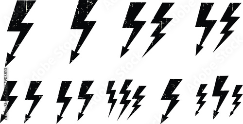 Set of black and white lightning bolt icons, various electric power and energy flash symbols, minimalist thunder shapes collection for electricity, weather, or technology design elements.