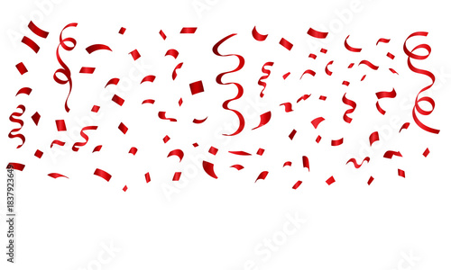 Festive red and white confetti and streamers falling down for a celebration