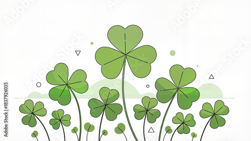 Green clover leaves arranged in a pattern on white background  