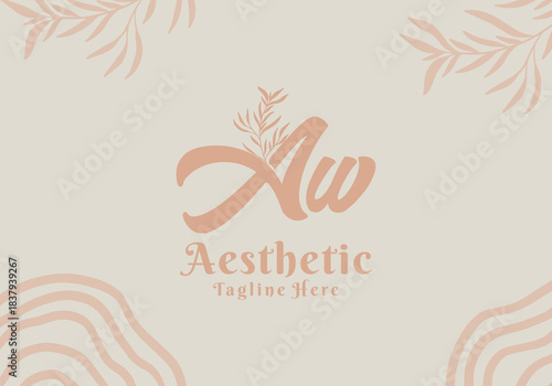 Brush style Aw initial letter logo with aesthetic leaf accents