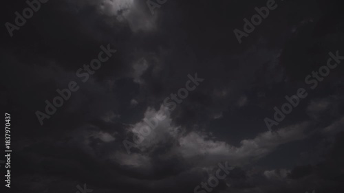 Wallpaper Mural Dark, moody storm clouds moving rapidly across sky. Dramatic background for horror, thriller, or weather concepts Torontodigital.ca