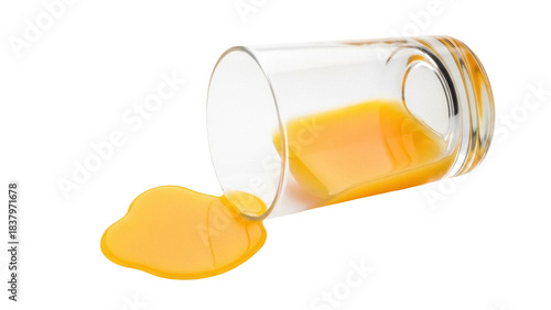 Tableau sur toile Isolated Spill of orange juice from a glass, studio shot, tasty fruit drink spil