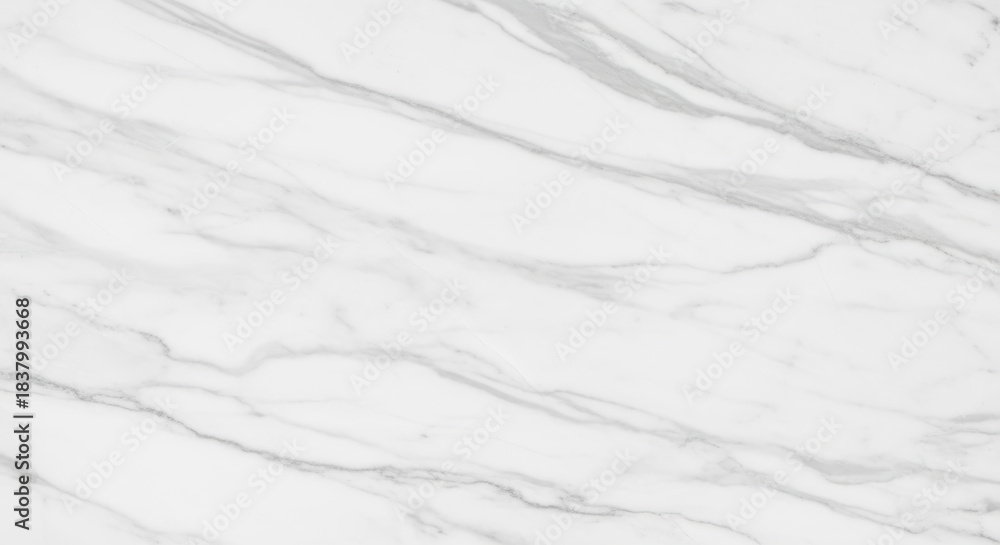 Obraz premium White marble stone surface with subtle gray veining pattern for elegant modern interior design and minimalist background texture