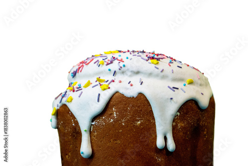 Iced Easter Kulich with Vibrant Confectionery Decor Isolated Close-Up