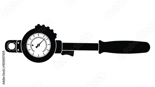 A black and white silhouette of a classic analog tire pressure gauge