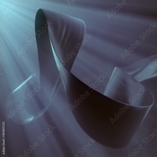 An elegant, light blue ribbon is twisted into a spiral and floats in rays of volumetric light