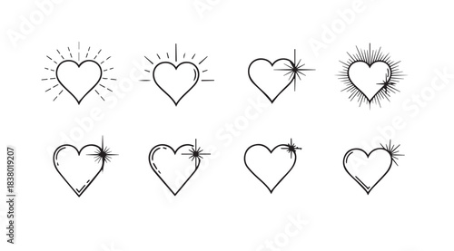 Collection of eight hand drawn heart silhouettes with sparkling effects silhouette