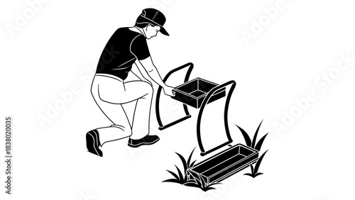 Man changing lawn aerator machine roller