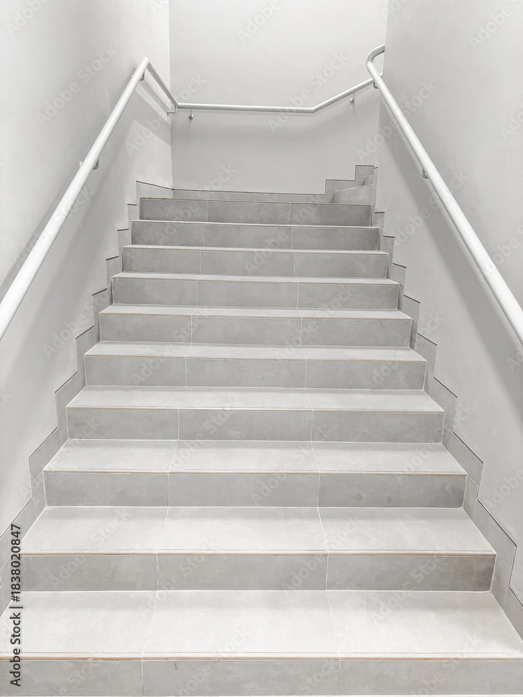 Fototapeta premium Minimalist White and Grey Staircase Perspective