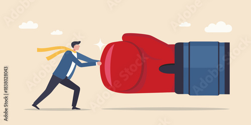 Man pushing a giant red boxing glove against a cloudy sky