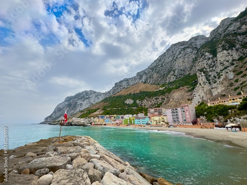 Catalan Bay: view of the bay and fishing village with beach in Gibraltar at a slightly cloudy summer day, Rock of Gibraltar, Strait of Gibraltar, Mediterranean Sea, British Overseas Territory, Europe